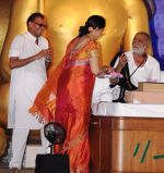 Madan Paliwal, Hema Mailini and Murari Bapu at the Murari Bapu in Nathdwara festival on 21st Aug 2012.JPG